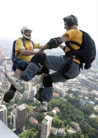 Gary Cunningham and Stephen Mueller doing a two way jump off KL Tower.