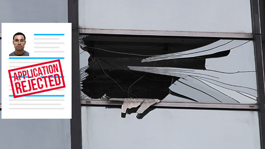 Uninvited BASE jumper James Marples smashes window after having a building strike at Menara Tun Mustapha (Sabah Foundation Building) in 2014