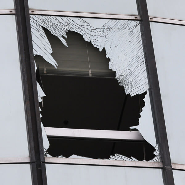 Window smashed after BASE jumper hit it at Menara Tun Mustapha (Sabah Foundation Building) in 2014